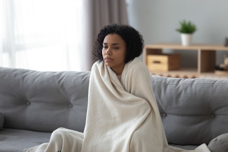 Woman Feeling Cold At Home